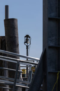 Low angle view of street light against sky