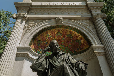 Low angle view of statue of historic building