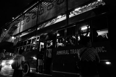 People standing at night