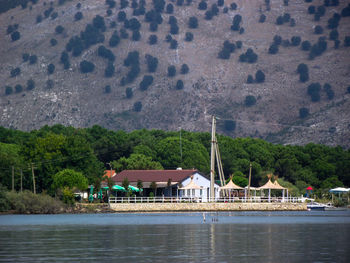 View of lake against buildings