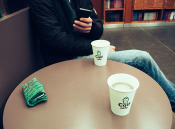 Close-up of coffee cup on table