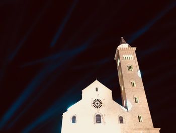 Low angle view of building against sky at night