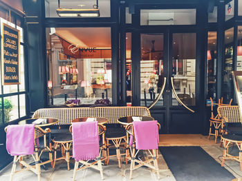 Empty chairs and tables in cafe