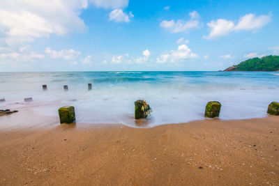 Scenic view of beach against sky