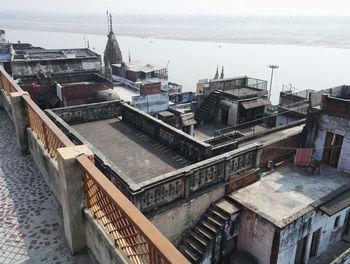 High angle view of buildings in city against sky