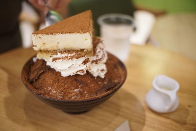 Close-up of cake served on table