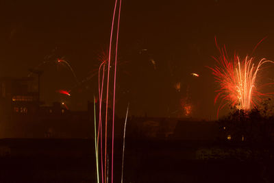 Firework display at night