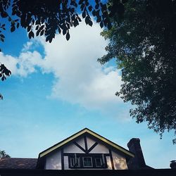 High section of building against blue sky