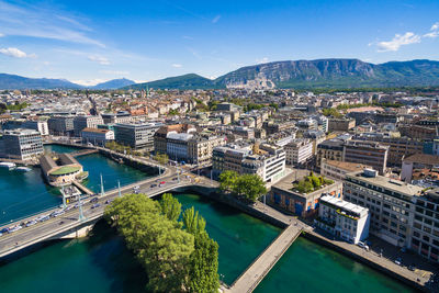 High angle view of river amidst buildings in city