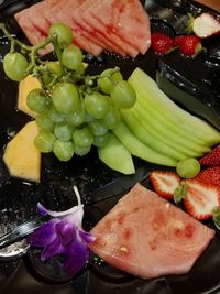 High angle view of chopped fruits in plate