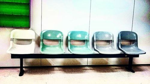 Empty chairs in a row