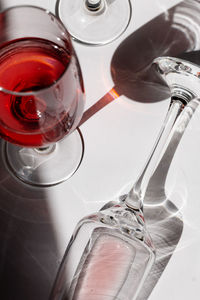 High angle view of wine glasses on table