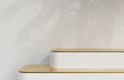 Close-up of empty picture frame on bed