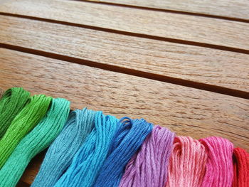 High angle view of multi colored wool on table