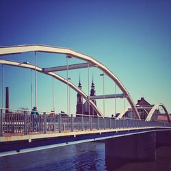 View of bridge against clear blue sky