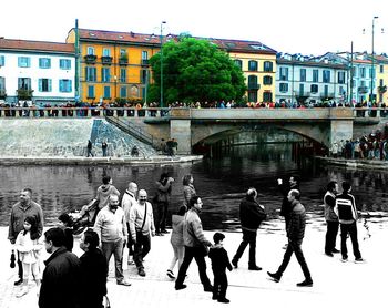 Group of people in front of buildings