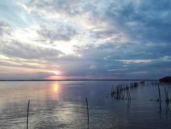 Scenic view of sea against sky at sunset