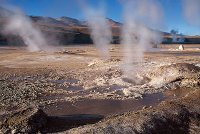 Smoke emitting from volcanic mountain