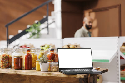 Man using laptop at office