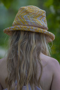 Rear view of woman wearing hat