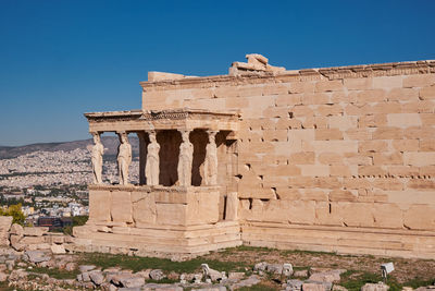 Low angle view of old ruins against clear sky