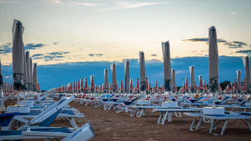 Boats moored in row