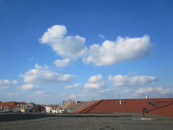 Residential district against blue sky