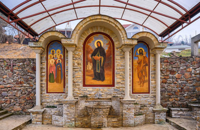 View of statues on wall of building