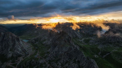 Scenic view of mountains against sky during sunset