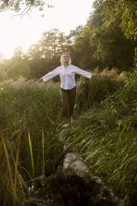 Full length of man standing on field