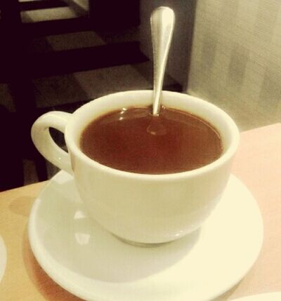 CLOSE-UP OF COFFEE ON CUP