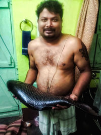 Young man looking at camera