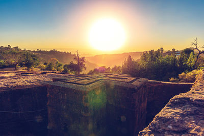 Scenic view of landscape against sky during sunset