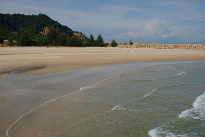 Scenic view of beach against sky