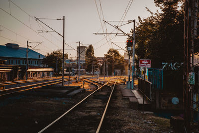 Train on railroad tracks against sky