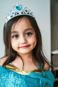 Portrait of a smiling girl dressing as a arabian princess.