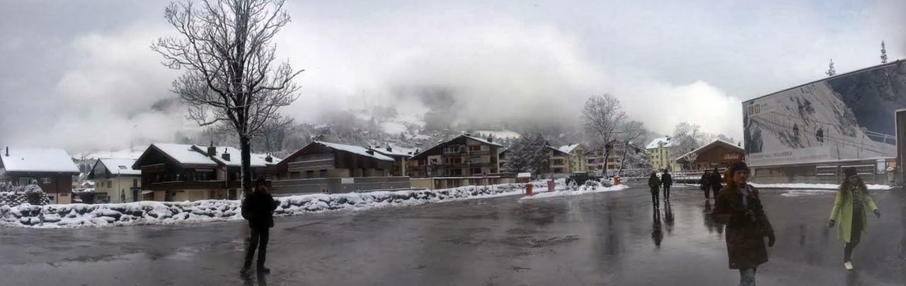 building exterior, weather, winter, architecture, built structure, snow, cold temperature, sky, season, cloud - sky, house, residential structure, cloudy, water, lifestyles, cloud, bare tree, walking