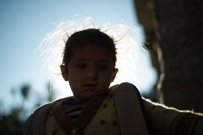 Portrait of cute girl looking at camera