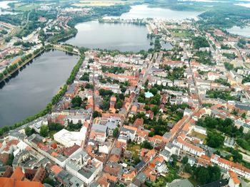 High angle view of townscape by river