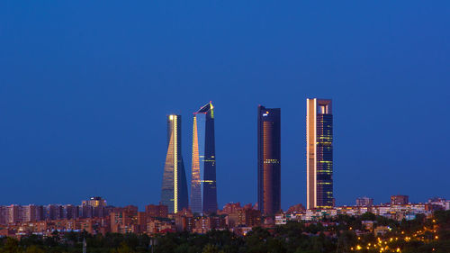 Illuminated cityscape at night