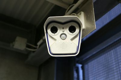 Low angle view of security camera 