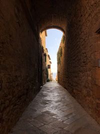 Narrow alley along walls