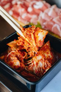 High angle view of meat on barbecue grill