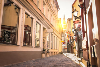 Alley amidst buildings in city