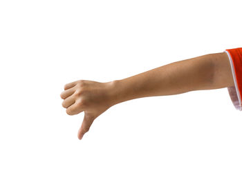 Close-up of human hand against white background