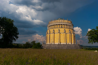 View of castle against cloudy sky