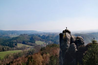 Castle on mountain against sky