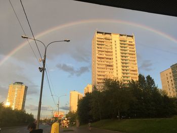 Street and buildings against sky