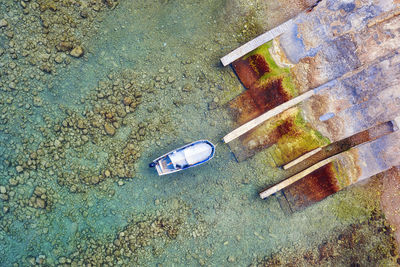 High angle view of bottle on garbage