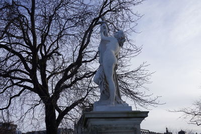 Low angle view of statue against sky